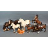 A Beswick Dapple Grey Shire Horse 818 together with seven other Beswick model horses