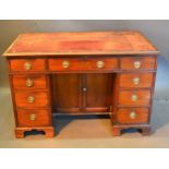 A 19th Century Mahogany Twin Pedestal Desk, the red tooled leather inset top above nine drawers with