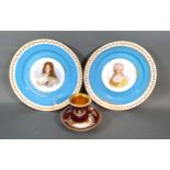 A Pair Of Sevres Porcelain Cabinet Plates each hand painted with a lady and gentleman upon a