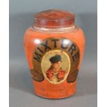 A 19th Century Stone Ware Tobacco Jar with enamelled lid decorated with a portrait upon an orange