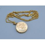 A 9ct Gold Locket with 9ct gold linked chain 6.5 gms