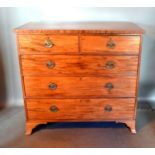 A 19th Century Mahogany Straight Front Chest of two short and three long drawers with brass