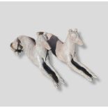 A Pair Of Lead Garden Ornaments in the form of greyhounds 120 cms long
