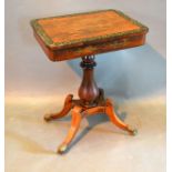 A Regency Work Table, the brass inlaid hinged top above a turned centre column and outswept inlaid