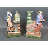 A Pair Of Rye Pottery Bookends in the form of gardeners 25 cms tall