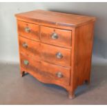 A Victorian Mahogany Bow Fronted Chest, the shaped top above two short and two long drawers with
