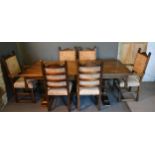 A 20th Century Oak Refectory Style Dining Table with twin end bulbous legs together with a set of