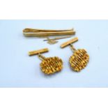 A 9ct Gold Tie Clip together with a pair of 9ct gold cufflinks, 22.7 gms