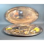 A Pair Of Large Oval Silver Plated Meat Platters together with a small collection of plated flatware