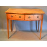 A 19th Century Mahogany Bow Fronted Side Table, the two frieze drawers with circular brass handles