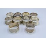 A Set Of Eight Victorian Silver Napkin Rings, Birmingham 1873 together with two other silver