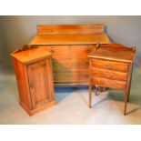 An Edwardian Mahogany Inlaid Chest of two short and two long drawers with circular brass handles