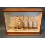 A Four Masted Model Boat 'Morning Cloud' within glazed cabinet, 85 cms wide x 62 cms high