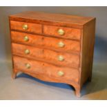 A 19th Century Mahogany Straight Front Chest of two short and three long drawers with oval brass
