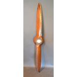 An Aeroplane Propellor inscribed DRGNQDH5258KII Gypsy Minor LHT with later mounted barometer 180 cms