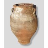 A Large Terracotta Garden Pot of oviform 110 cms tall