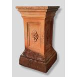 A Terracotta Square Garden Pedestal with stepped base 83 cms tall 43 cms square