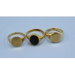 Two 9ct Gold Signet Rings together with a yellow metal signet ring inset stone 13.6 gms all in