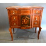 A French style inlaid chest, the moulded line inlaid top above three marquetry inlaid drawers with