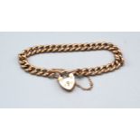 A 9ct. Gold Curb Link Bracelet with Padlock Clasp 10.4 gms.