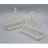 A Pair Of Silver Plated Six Division Toast Racks in the form of rifles 19 cms long
