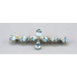 A 9ct. Gold Aquamarine And Diamond Set Brooch set with eight aquamarine interspaced with diamonds,