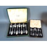 A Set Of Eight London Silver Grapefruit Spoons within fitted case together with a set of six