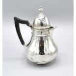 An Edwardian Silver Coffee Pot with shaped ebonised handle, London 1904, 11 ozs.