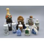 A Chinese Glass Scent Bottle reverse painted with figures and with agate stopper together with
