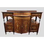 An Edwardian semi bow-fronted marquetry inlaid side cabinet, with an arrangement of drawers and