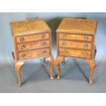 A Pair Of Early 20th Century Walnut Three Drawer Bedside Chests each raised upon cabriole legs