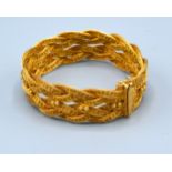 An 18ct. Gold Bracelet of interwoven form 41 gms. 19 cms long