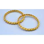 A Pair Of Tested High Grade Gold Bangles 32.7 gms. 6.5 cms diameter