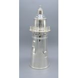 A Silver Plated Cocktail Shaker in the form of a lighthouse 34 cms tall