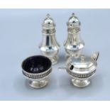 A Sheffield Silver Four Piece Condiment Set to include salt, pepper, mustard and salt retailed by
