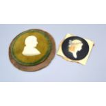 A 19th Century Wax Silhouette Of A Gentleman together with another similar silhouette of a lady