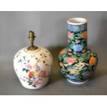 A Japanese Bottleneck Vase decorated in polychrome enamels 37 cms tall together with a table lamp