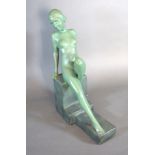 An Art Deco Plaster Figure by G. Leonardi depicting a nude female in green 30 cms tall