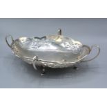 A George V Silver Bowl of oval pierced form with four shaped handles and four hoof supports,