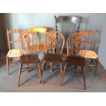 An Early 20th Century Captain's Armchair together with an American armchair, a pair of Victorian