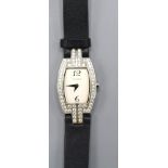 Tiffany & Co. 18ct. White Gold Tonneau Diamond Set Ladies Wrist Watch, a black leather strap set