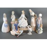 A Lladro Porcelain Model Of A Girl together with two other Lladro porcelain figures and various