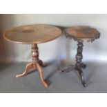 A Victorian Carved Oak Pedestal Table together with a 19th Century pedestal table