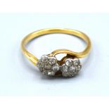 A Yellow Metal Double Diamond Cluster Ring 2 gms. ring size M