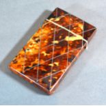 A Tortoiseshell Card Case with metal inlaid decoration 9 x 5 cms