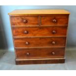A Victorian Mahogany Straight Front Chest, the moulded top above two short and three long drawers