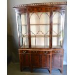 A Early 20th Century Mahogany Break-Front Library Bookcase by Maple & Co, the pierced gallery top