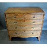 A 19th Century Mahogany Straight Fronted Chest of two short and three long drawers with circular