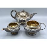 A George IV Silver Three Piece Tea Service comprising teapot, two handled sucrier and cream jug