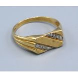A 9ct. Yellow Gold Gentleman's Ring set with two small diamonds, ring size Y, 3.4 gms.